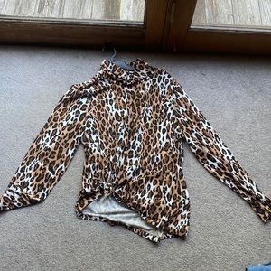 Cheetah print turtle neck long sleeve shirt